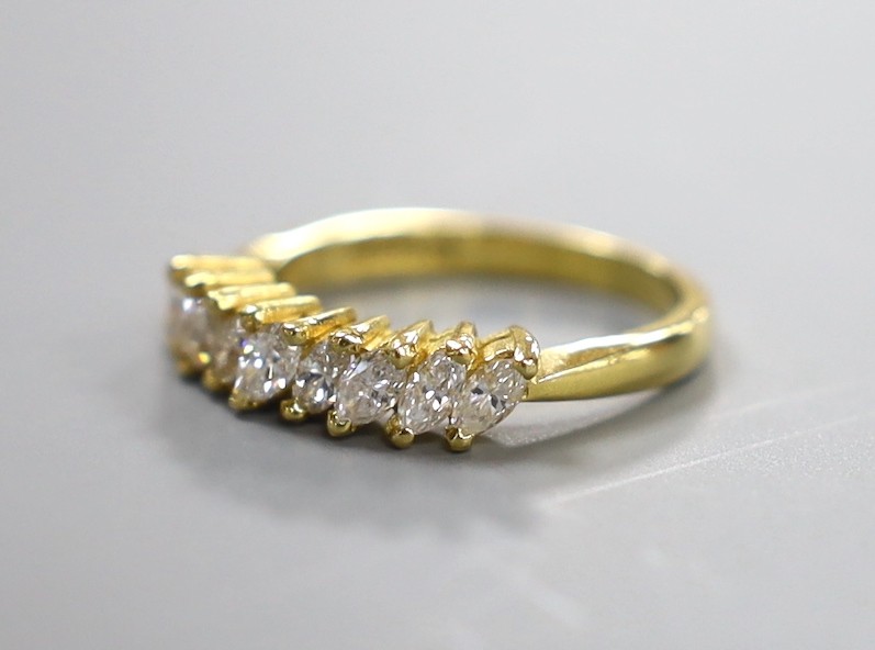 A modern 18ct gold and nine stone marquise cut diamond set half hoop ring, size O, gross weight 4.2 grams